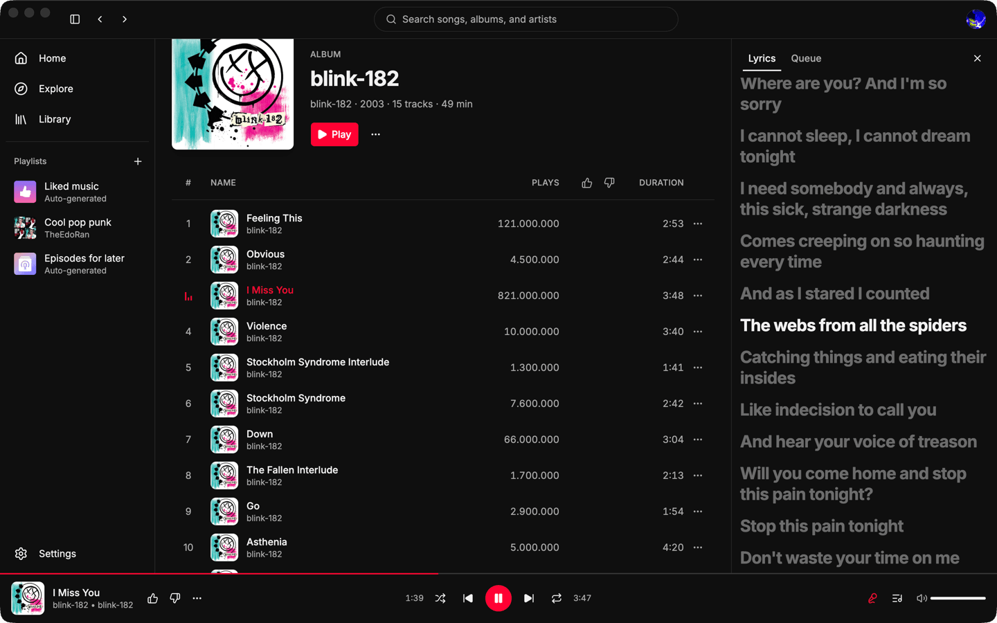 Time-synced lyrics beside an album track table, with the current line highlighted